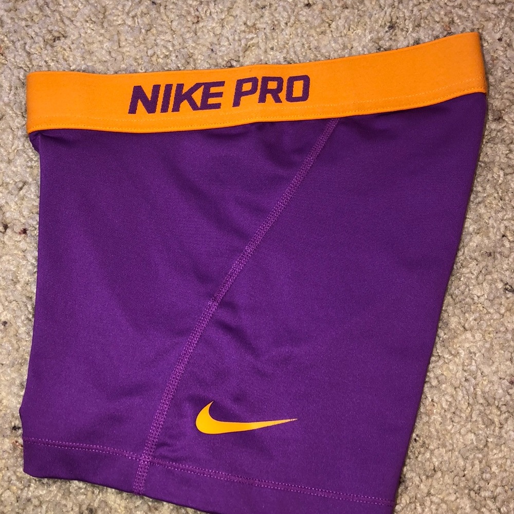 Purple Nike pros.